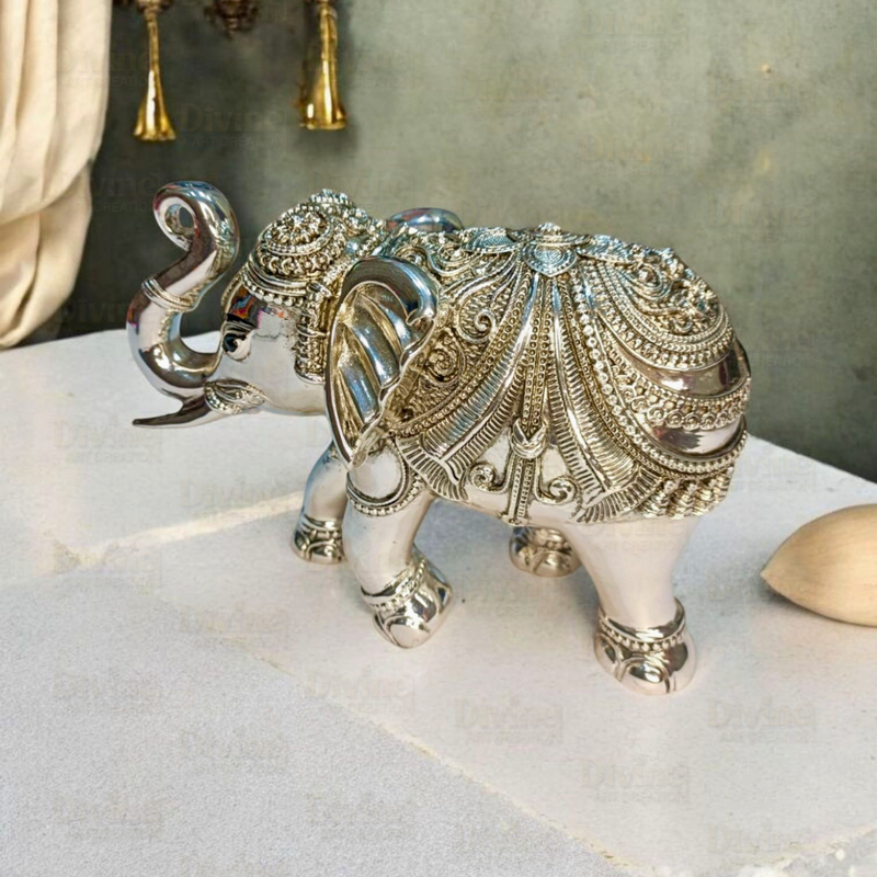 Silver-Plated Antique Finish Trunk-Up Elephant Idol – Decorative Showpiece for Home & Vastu - Divine Art Creation